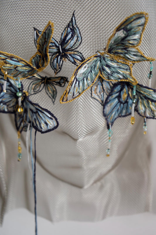 Whispers of Time: Butterfly Mask IV